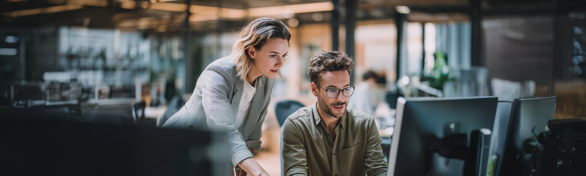 Business professionals collaborating on a project